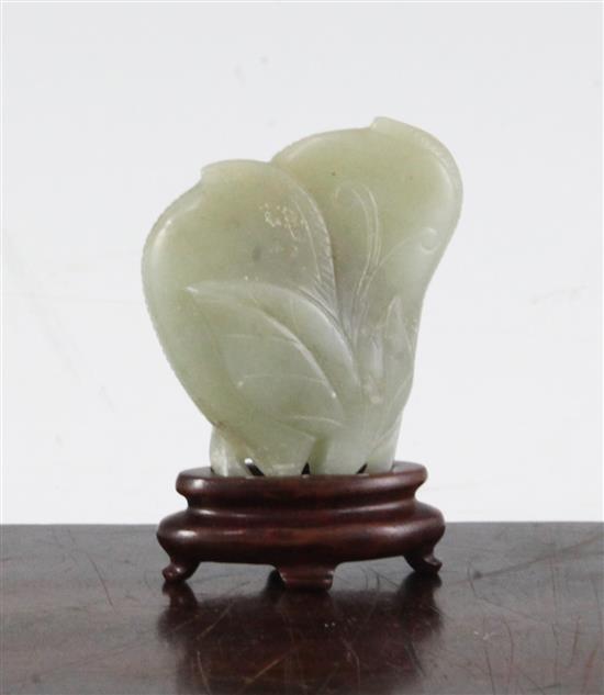 A Chinese celadon jade carving of gourds, 18th/19th century, 6cm, wood stand